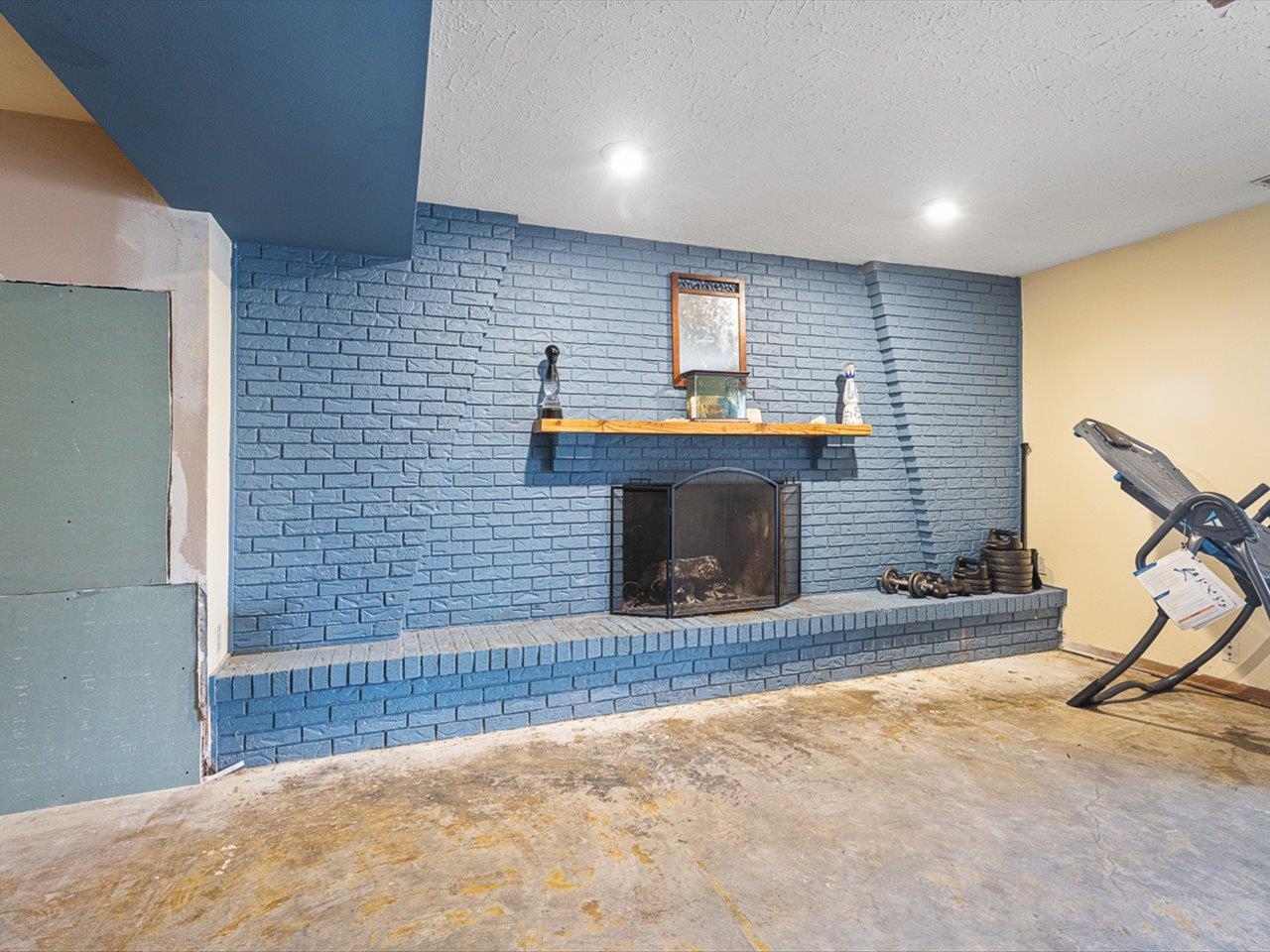 10383 Atwood Road Roscoe, IL 61073 - Photo 30 of 42 a view of a livingroom with a fireplace and window