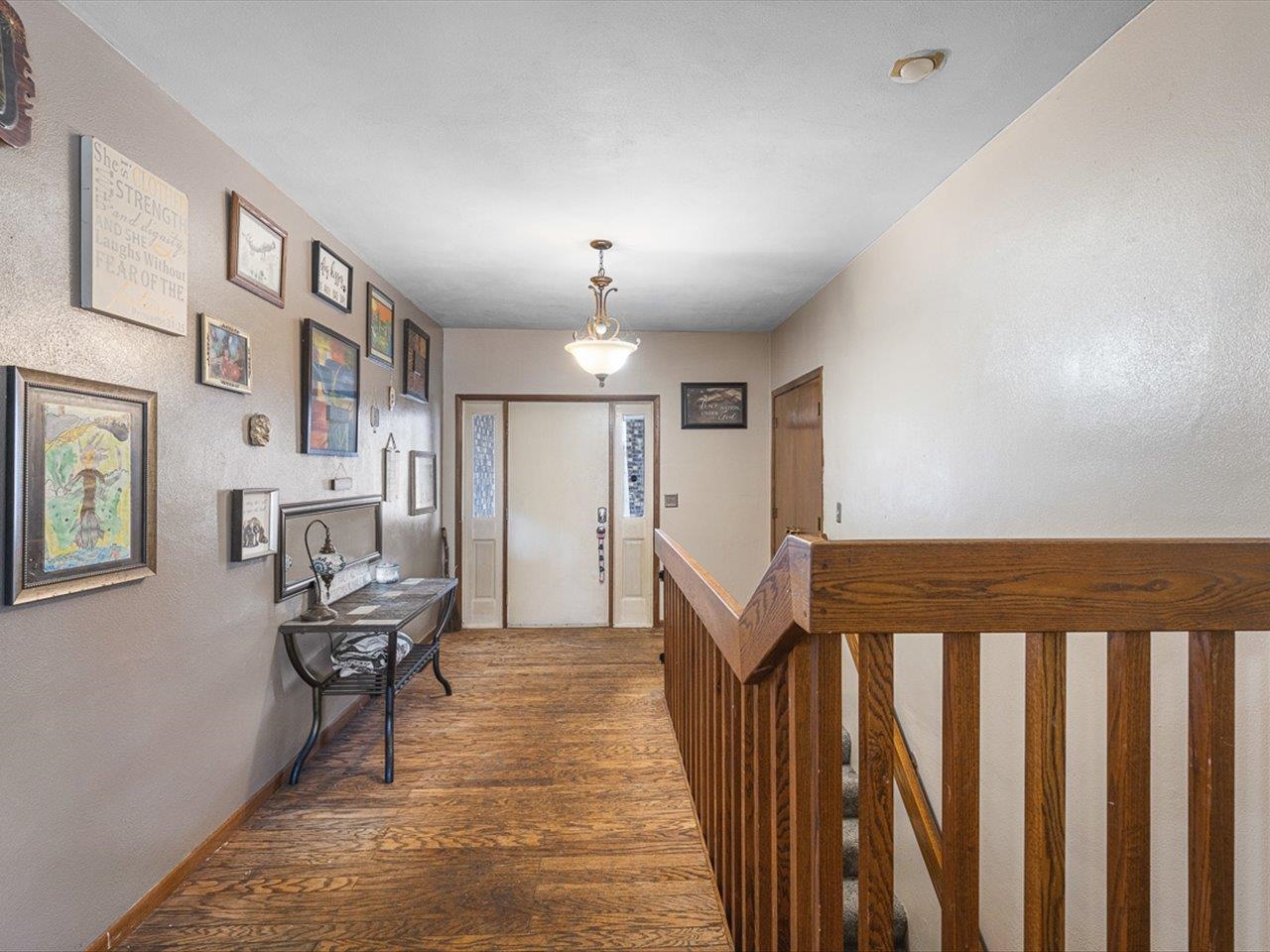 10383 Atwood Road Roscoe, IL 61073 - Photo 6 of 42 a view of a hallway with seating area