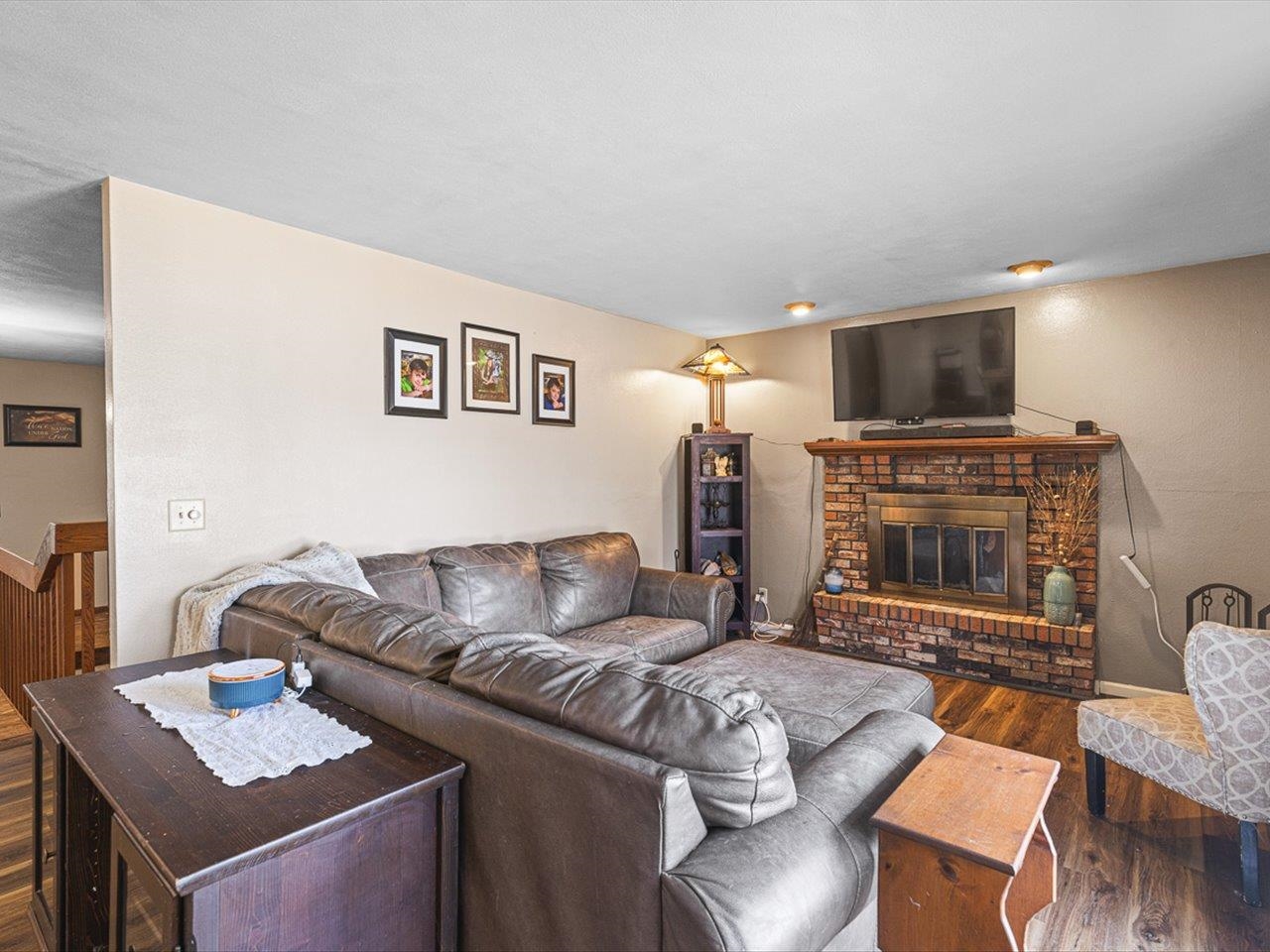 10383 Atwood Road Roscoe, IL 61073 - Photo 9 of 42 a living room with furniture and a fireplace