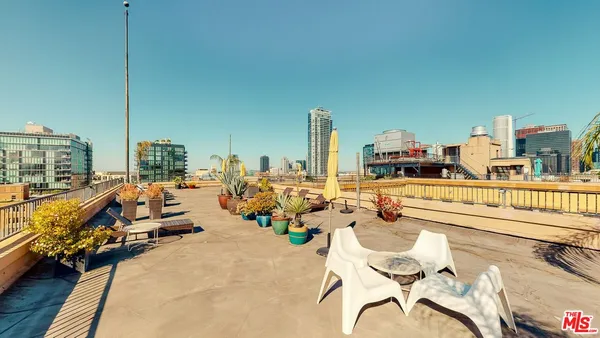 a view of a terrace with chairs