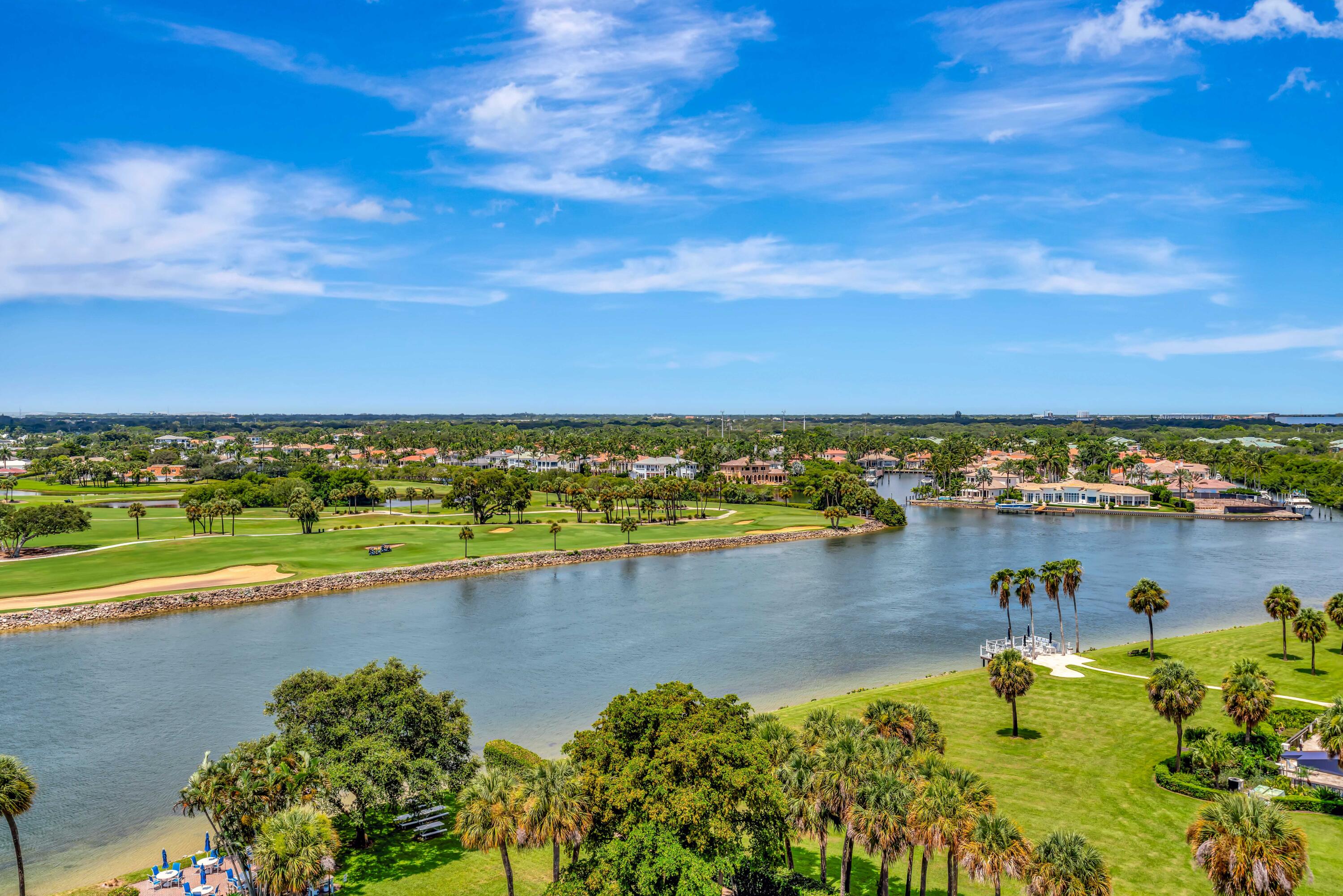 336 Golfview Road, Unit 1104 North Palm Beach, FL 33408 - Photo 19 of 54 a view of a lake with a houses