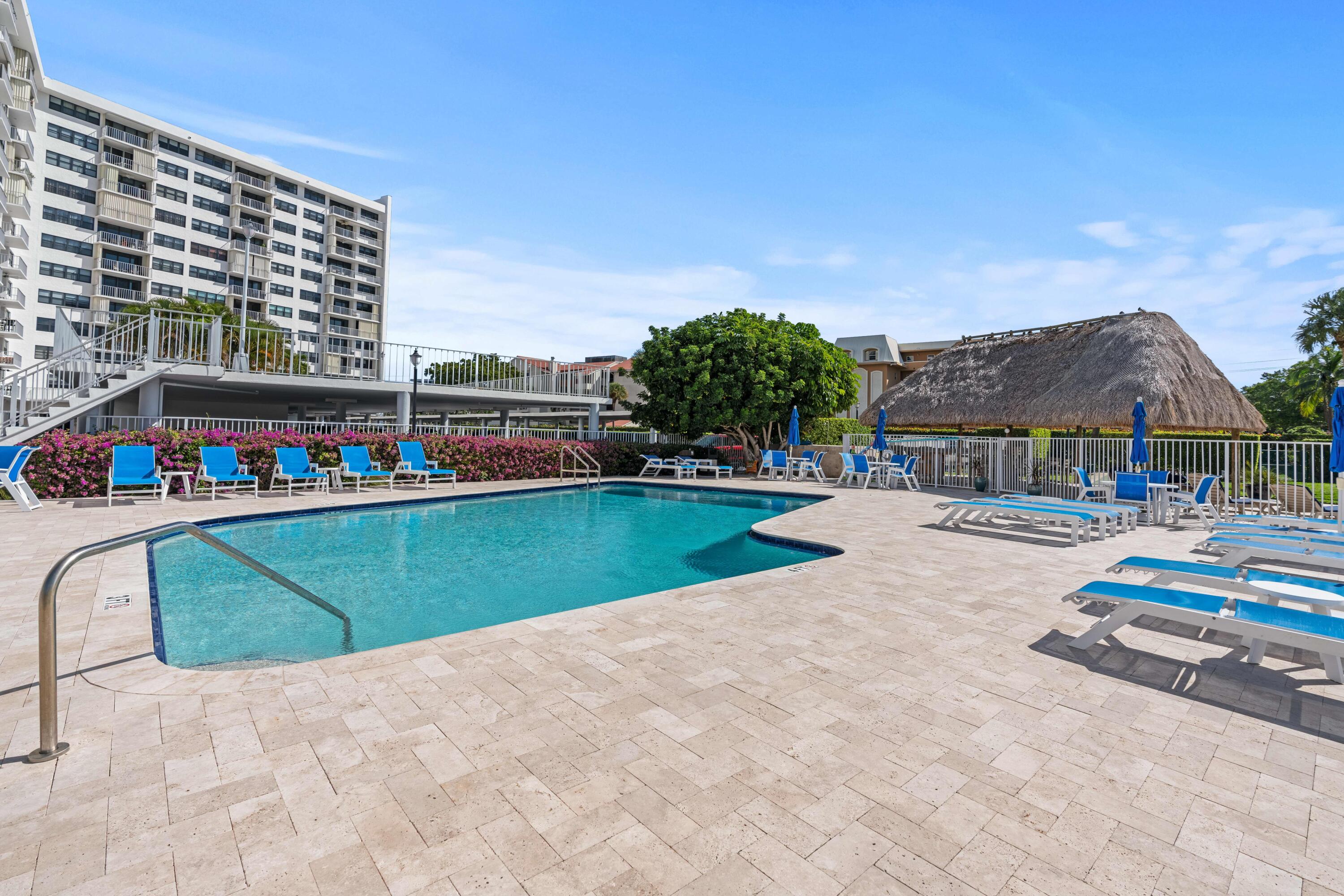 336 Golfview Road, Unit 1104 North Palm Beach, FL 33408 - Photo 38 of 54 a view of multiple houses with swimming pool
