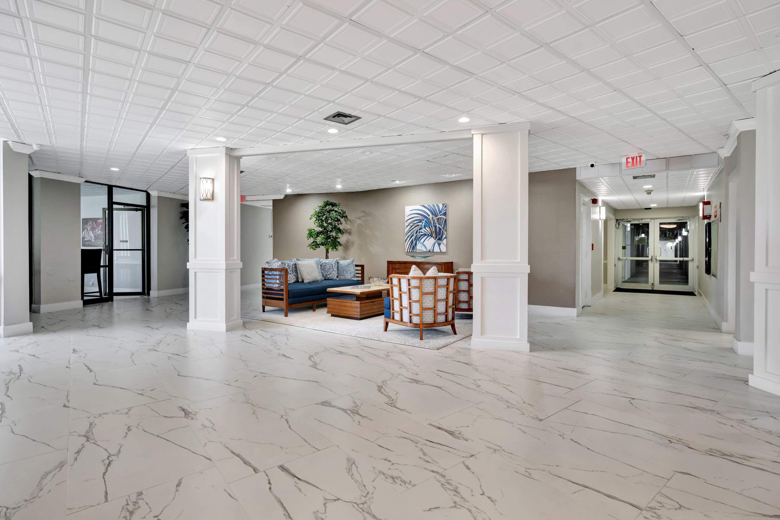 336 Golfview Road, Unit 1104 North Palm Beach, FL 33408 - Photo 49 of 54 a view of a hallway with seating area