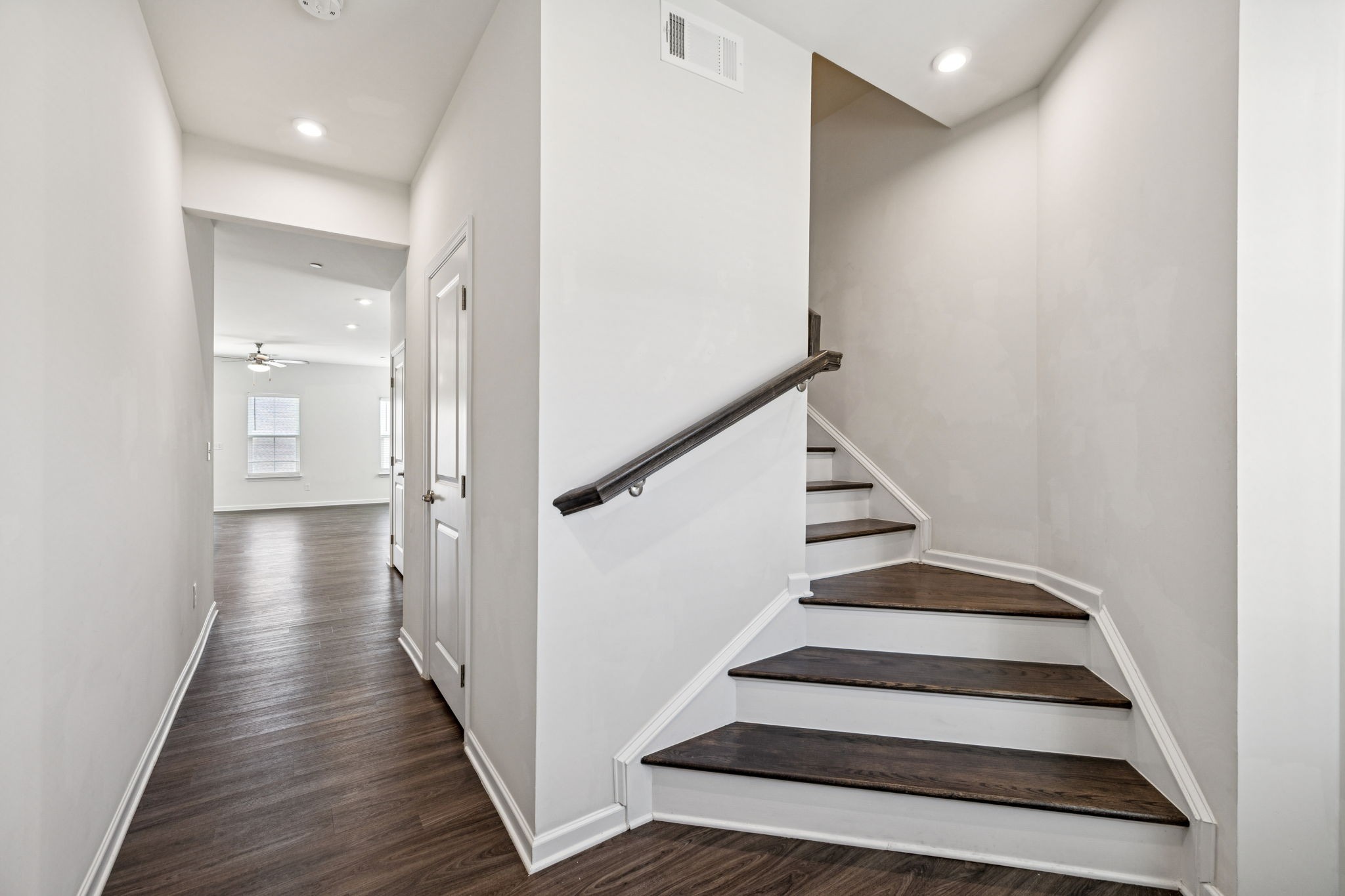 153 Keelon Gap Road Spring Hill, TN 37174 - Photo 8 of 68 a view of a hallway with wooden floor and entryway