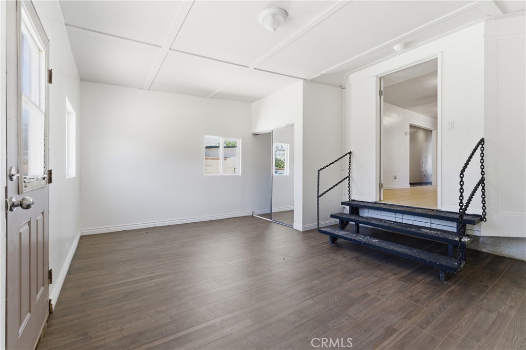 44509 Date Lancaster, CA 93534 - Photo 15 of 20 a view of room with wooden floor and windows