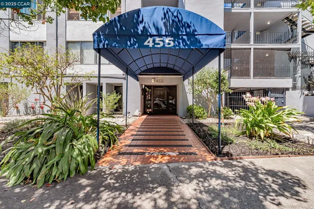 a front view of a house with a porch