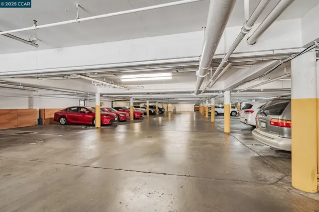 a view of a swimming pool with outdoor seating