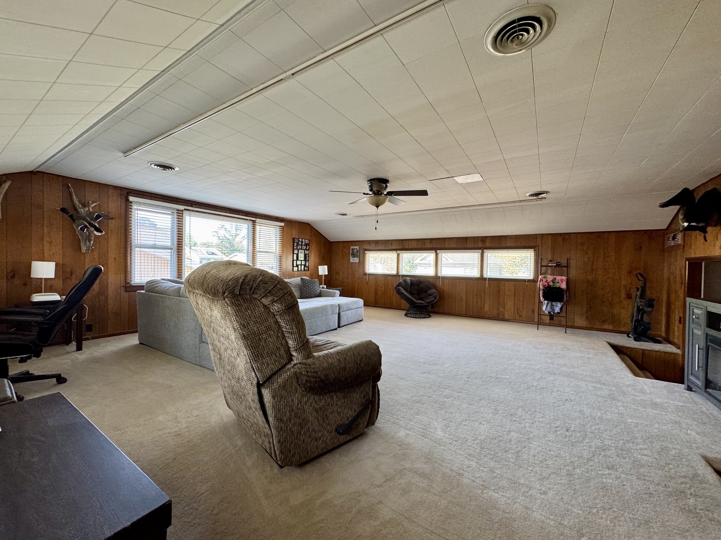 212 Mitchell Street Benton, IL 62812 - Photo 20 of 40 a living room with furniture a flat screen tv and a large window