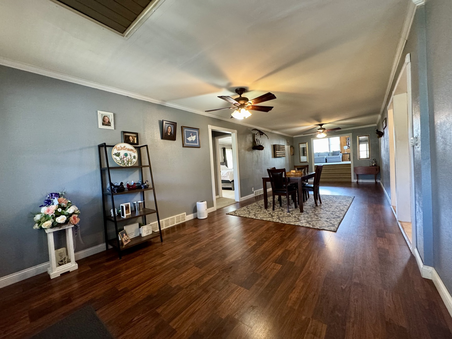 212 Mitchell Street Benton, IL 62812 - Photo 25 of 40 a view of a livingroom with furniture wooden floor and chandelier