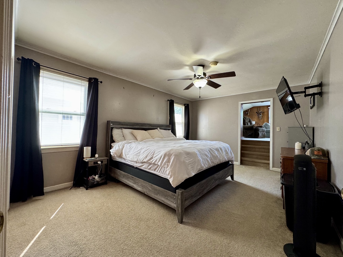 212 Mitchell Street Benton, IL 62812 - Photo 28 of 40 a bedroom with a bed and ceiling fan