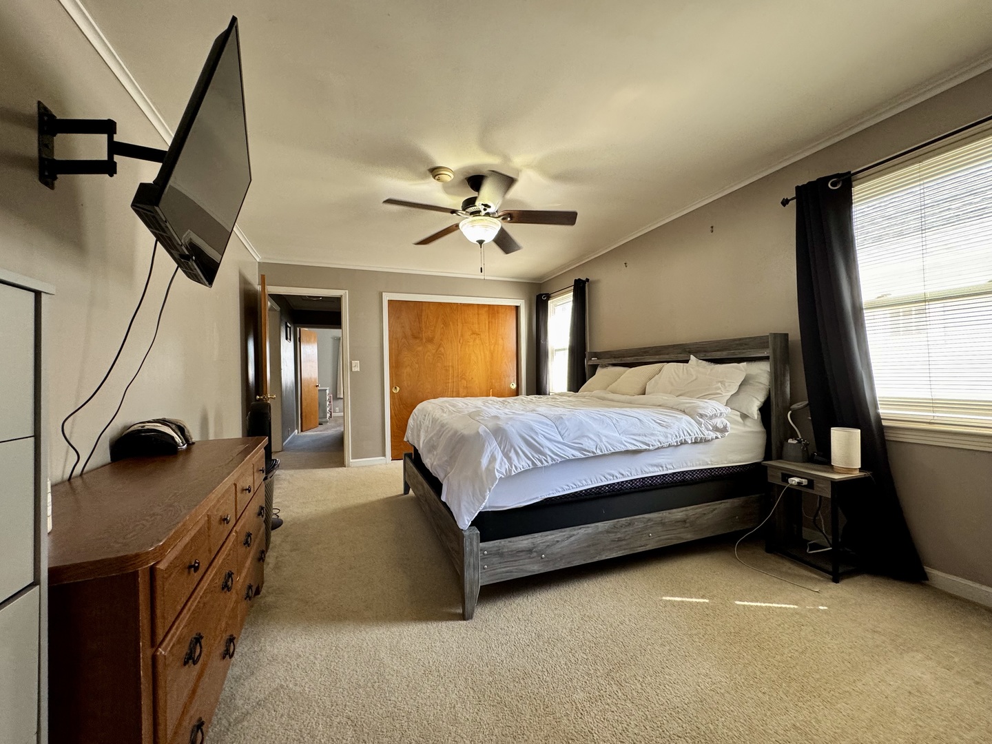 212 Mitchell Street Benton, IL 62812 - Photo 30 of 40 a bedroom with a bed dresser and a window