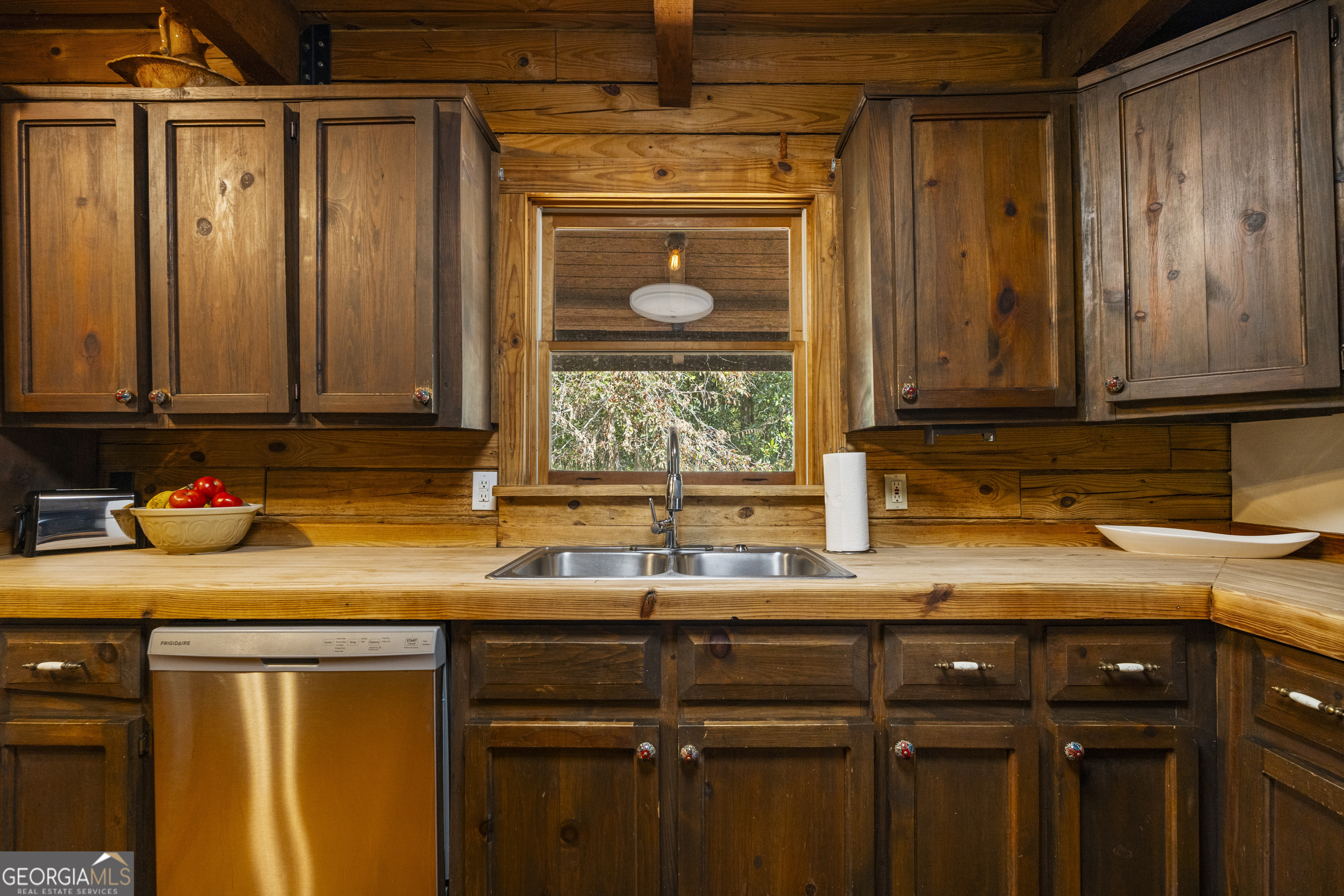 299 South L Street Hamilton, GA 31811 - Photo 14 of 36 a kitchen with a sink and cabinets