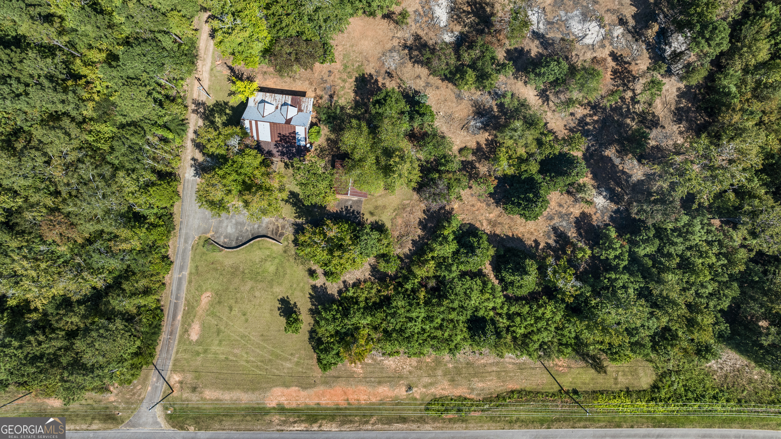 299 South L Street Hamilton, GA 31811 - Photo 10 of 36 a view of a yard