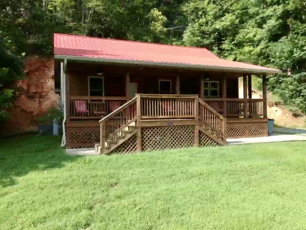 3000 Highwater Road Waverly, TN 37185 - Photo 23 of 26 a view of house with a yard and sitting area