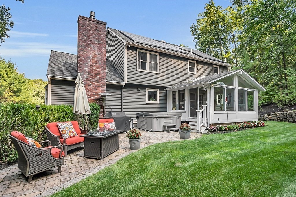 5 Abby Road Westford, MA 01886 - Photo 2 of 41 a view of a house with a patio and a yard