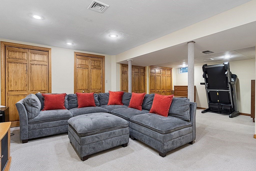 5 Abby Road Westford, MA 01886 - Photo 34 of 41 a living room with furniture and a window