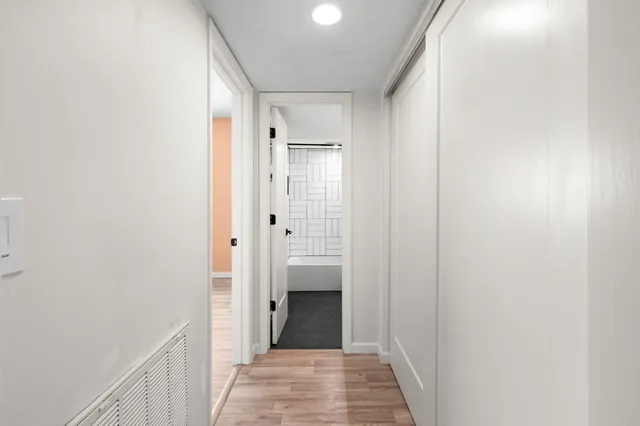 a view of entryway with washer and dryer