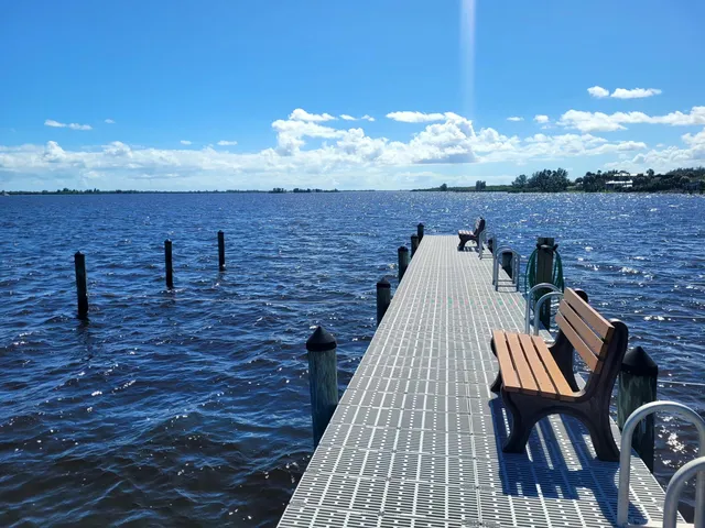 a view of a pathway both side of the house