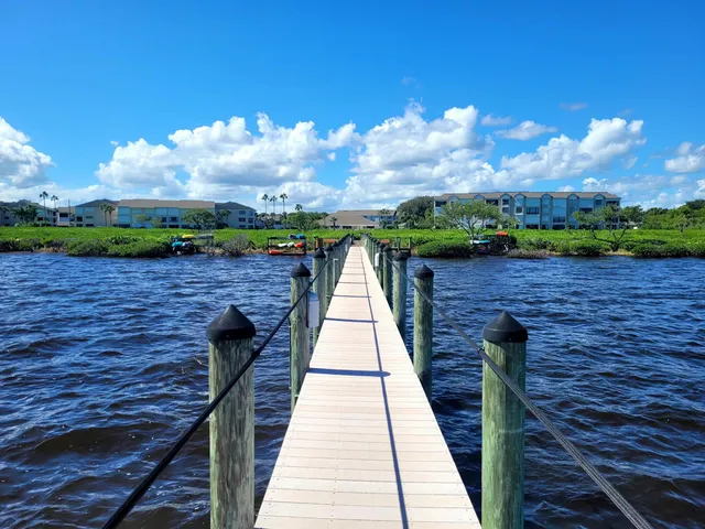 a view of a balcony with wooden floor