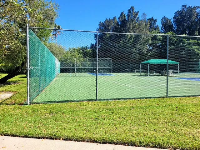 a view of a park with a slide