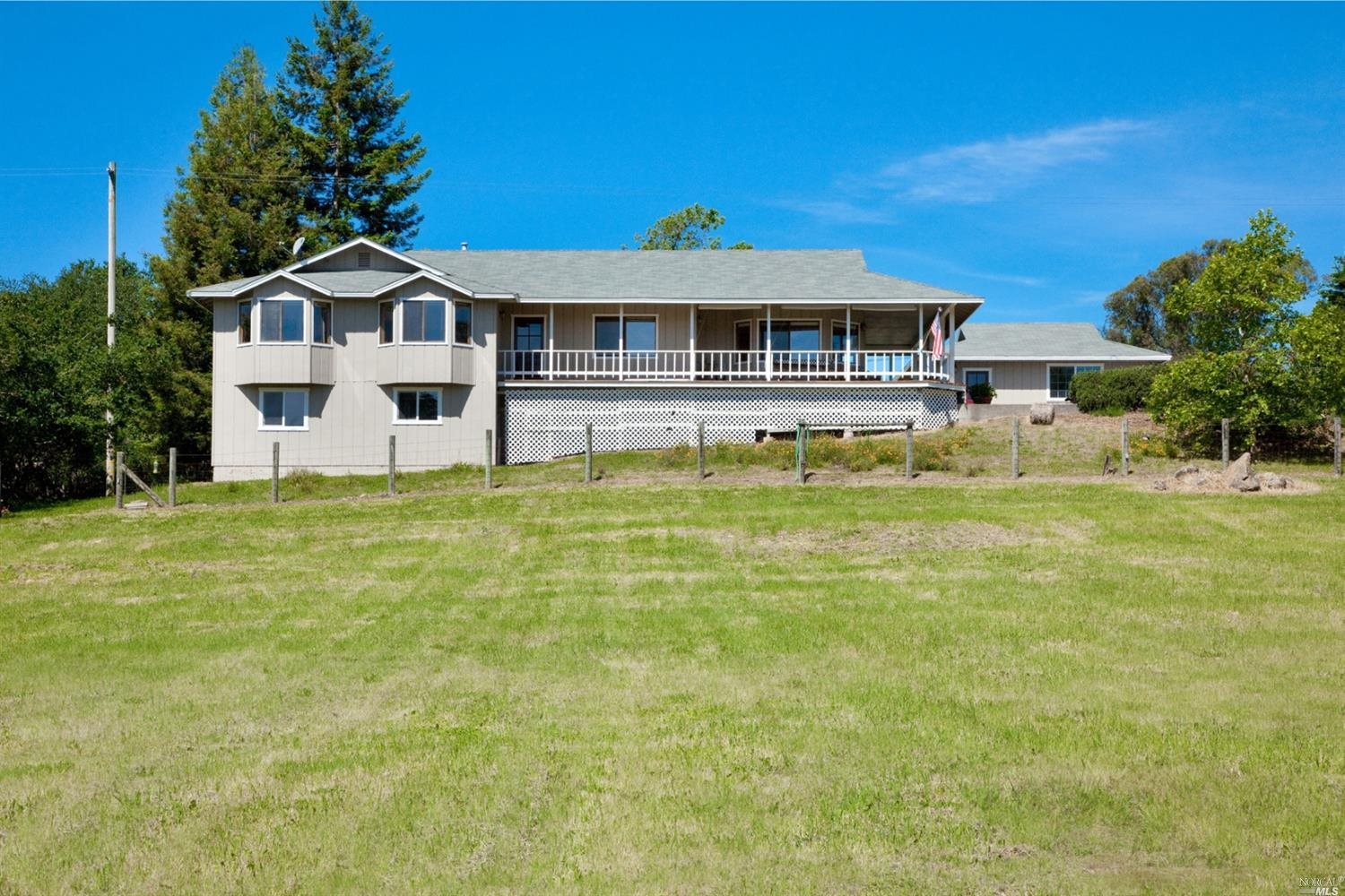 4717 Guenza Road Santa Rosa, CA 95404 - Photo 1 of 1 a front view of a house with a yard