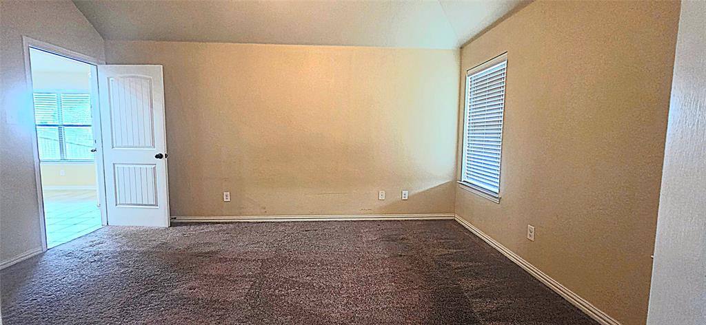 101 Hummingbird Drive Weatherford, TX 76085 - Photo 7 of 10 a view of an empty room with a window