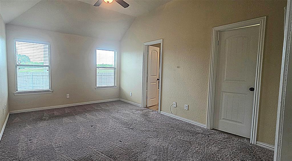 101 Hummingbird Drive Weatherford, TX 76085 - Photo 8 of 10 a view of an empty room with window and closet area