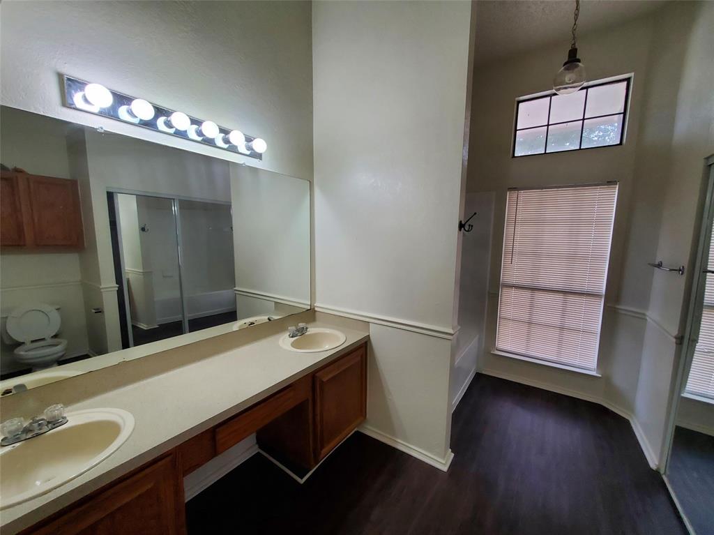 417 Antietam Way Mesquite, TX 75149 - Photo 7 of 9 a bathroom with a sink double vanity granite and a mirror