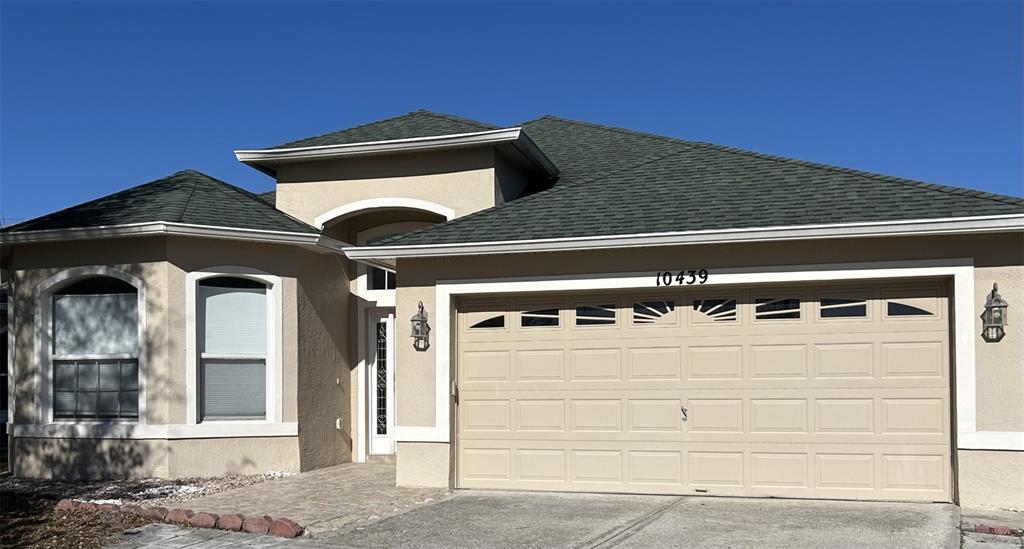 a black and white building with a outdoor space
