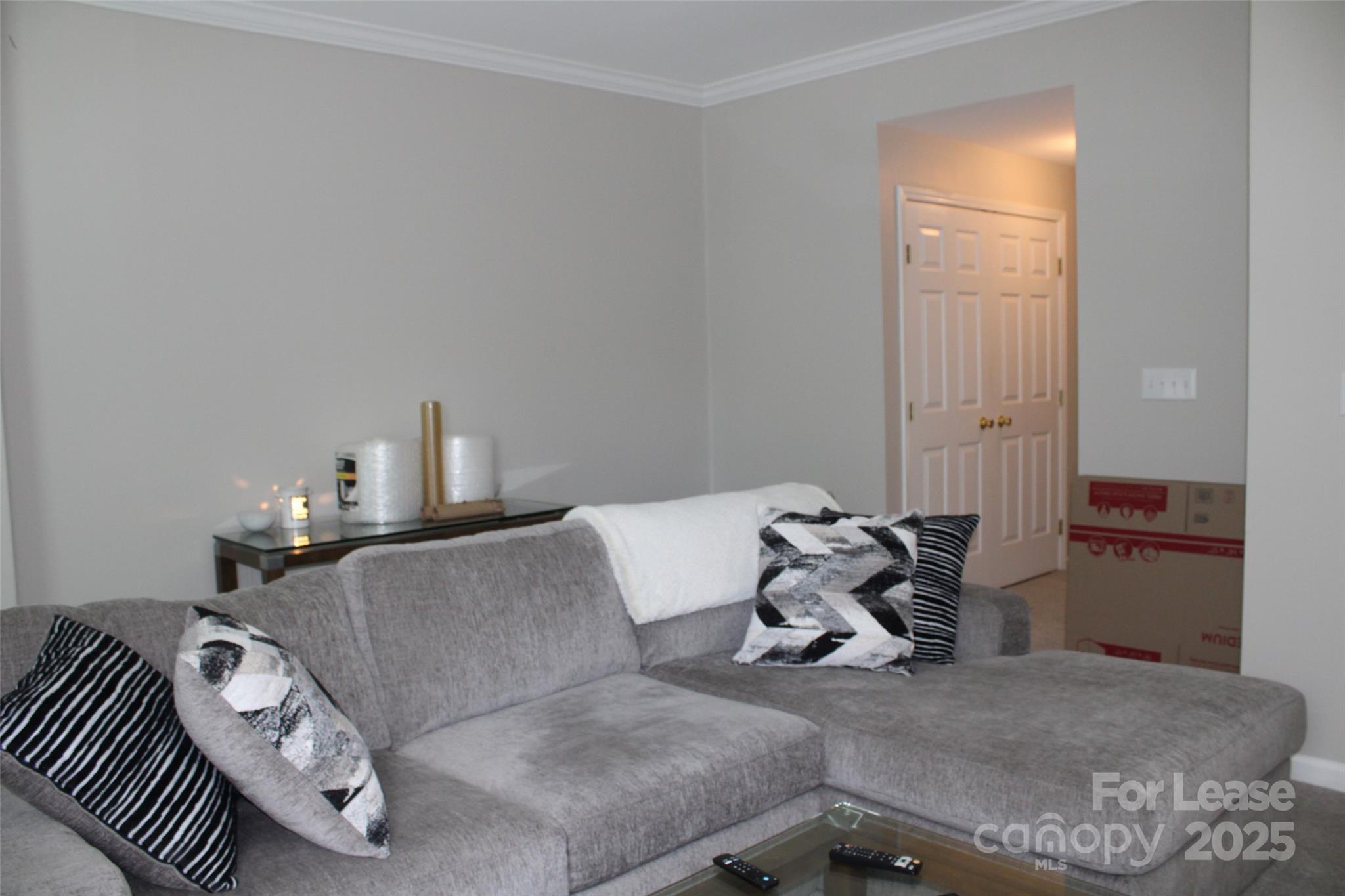 18630 Oakhurst Boulevard Cornelius, NC 28031 - Photo 8 of 20 a living room with furniture and a window