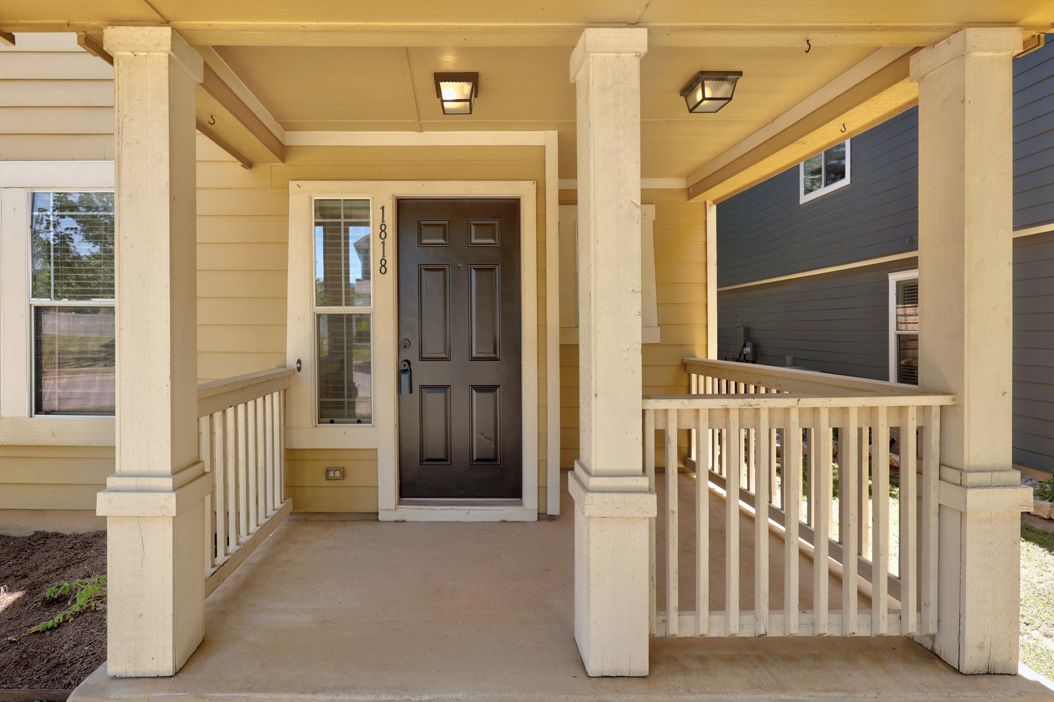 1818 Lost Maples Loop Cedar Park, TX 78613 - Photo 4 of 38 A welcoming front porch features sturdy columns and a durable concrete slab.