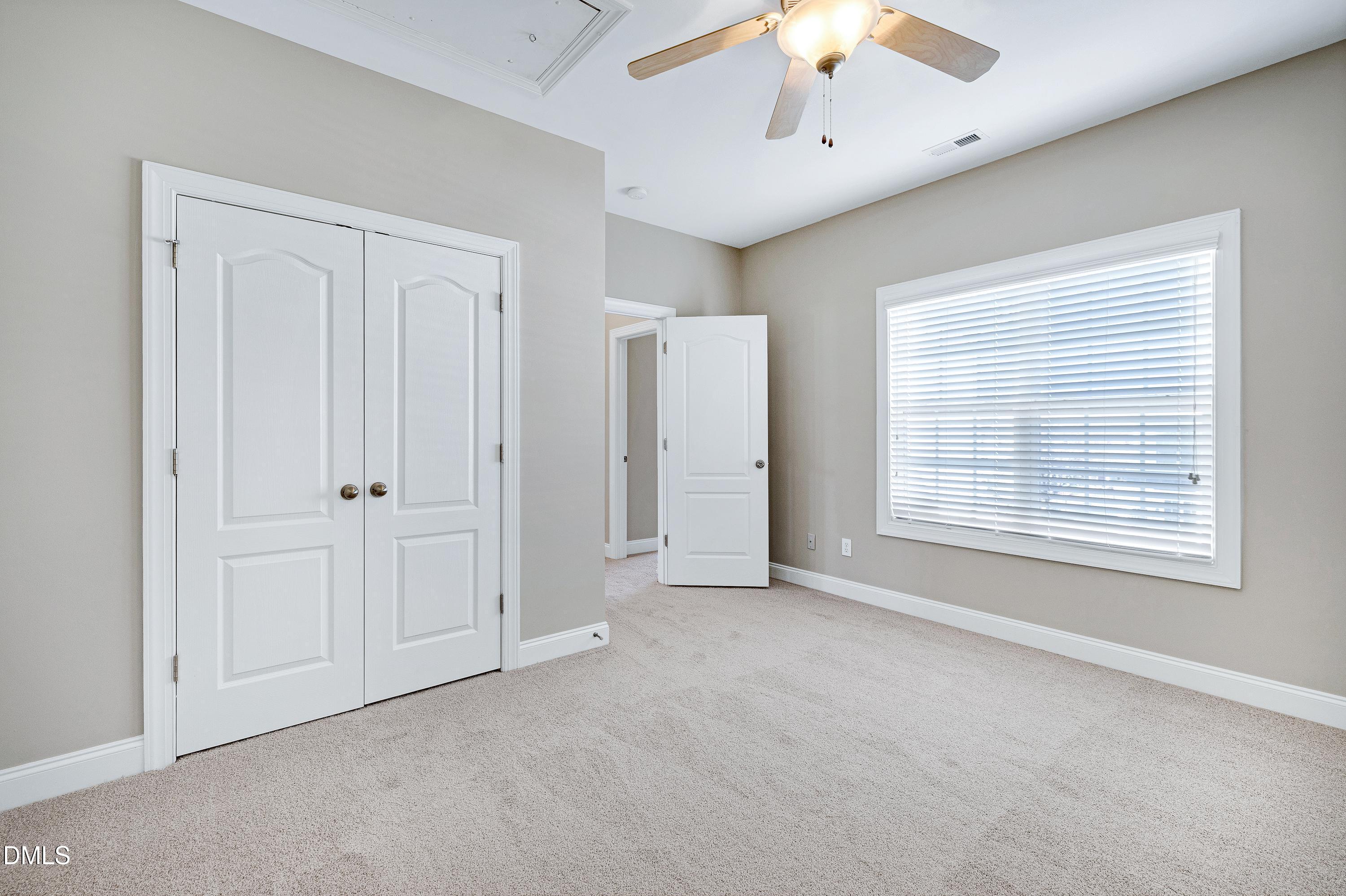 678 Democracy Street Raleigh, NC 27603 - Photo 43 of 67 a view of an empty room with a window