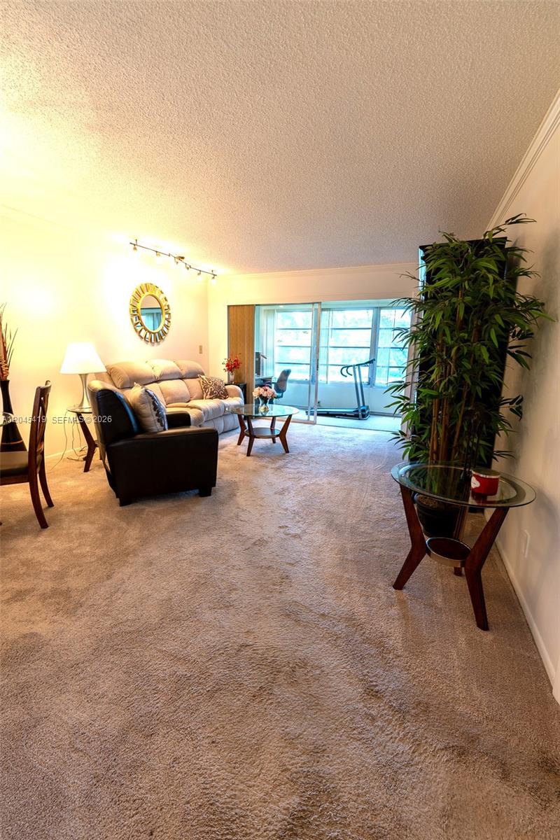 8814 West McNab Road, Unit 204 Tamarac, FL 33321 - Photo 10 of 23 Door View Living Room