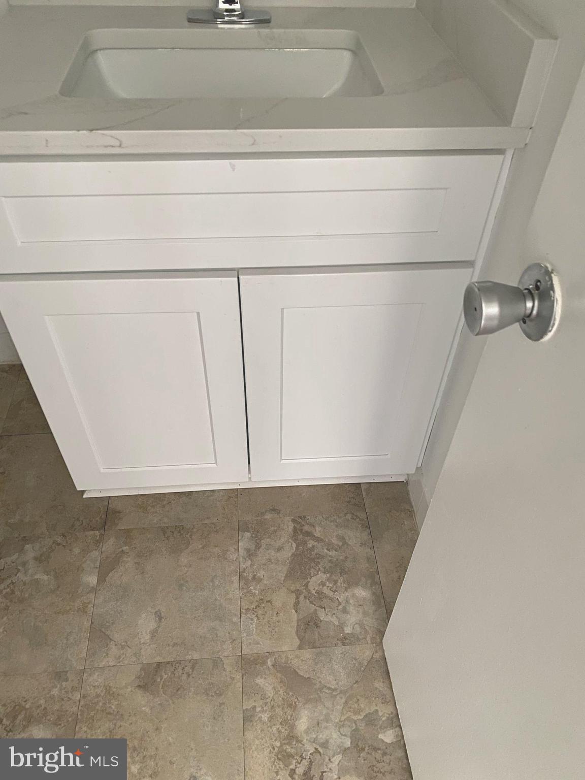 15702 Dorset Road, Unit 202 Laurel, MD 20707 - Photo 14 of 18 Updated sink & cabinet