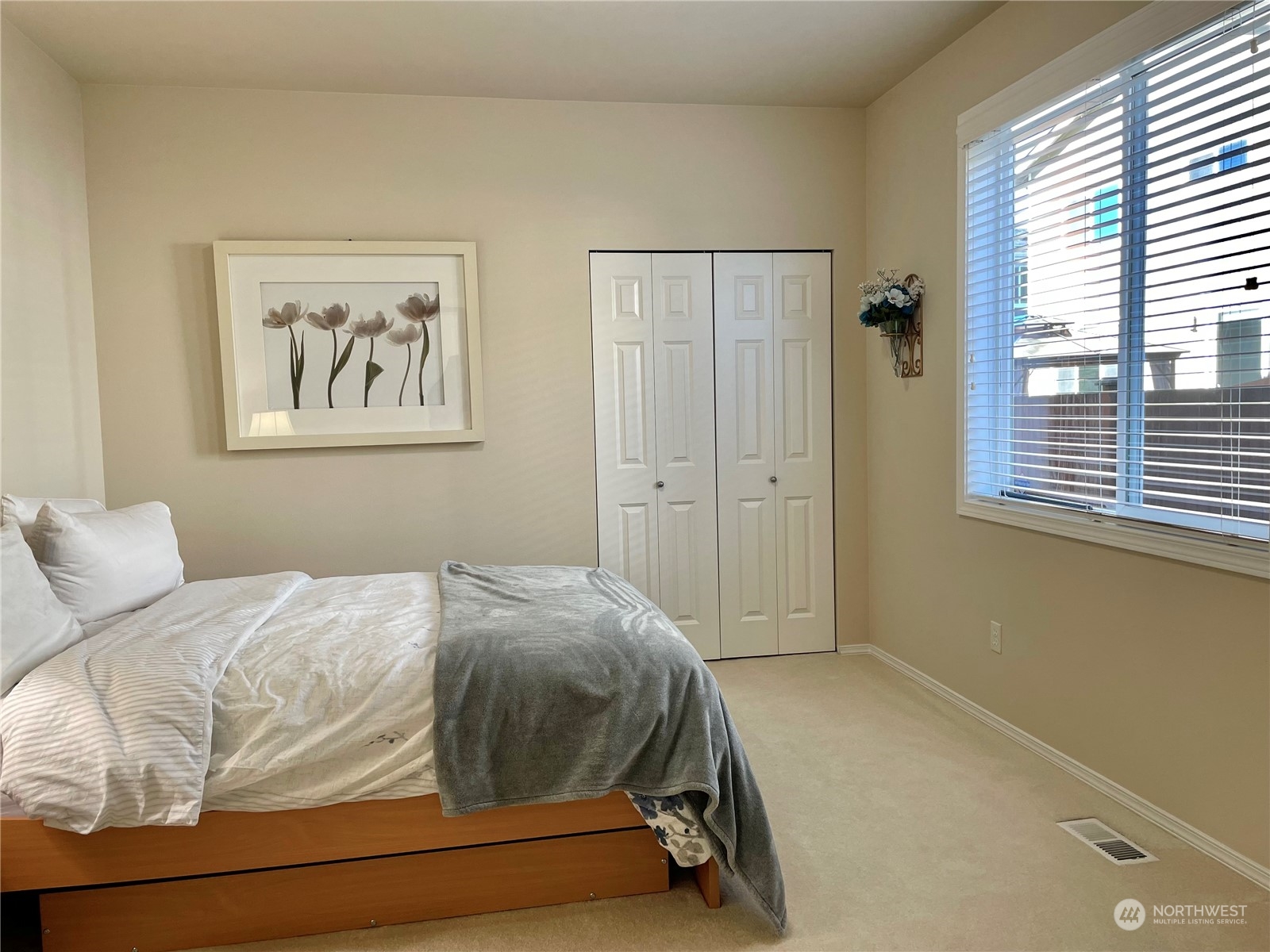 113 181st Street Southwest Bothell, WA 98012 - Photo 12 of 26 a bedroom with a bed and a window