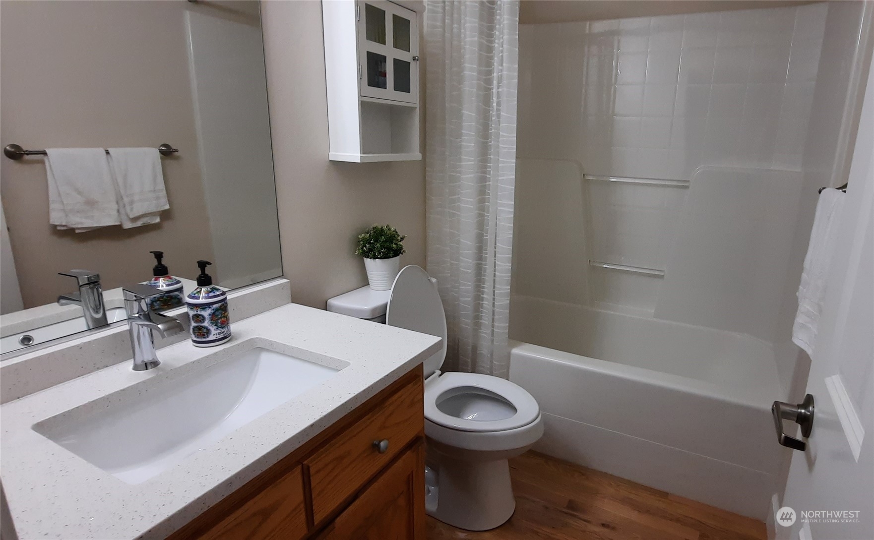 113 181st Street Southwest Bothell, WA 98012 - Photo 13 of 26 a bathroom with a sink toilet and shower