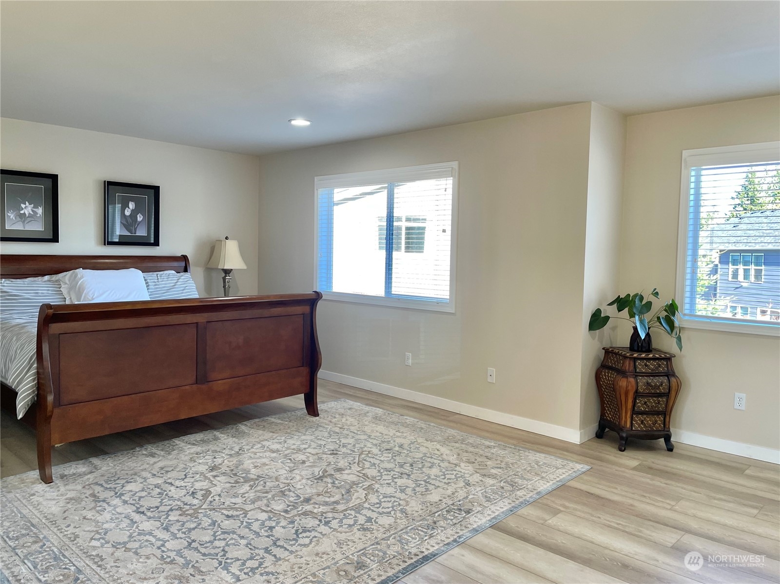 113 181st Street Southwest Bothell, WA 98012 - Photo 15 of 26 a bedroom with a bed and a dresser