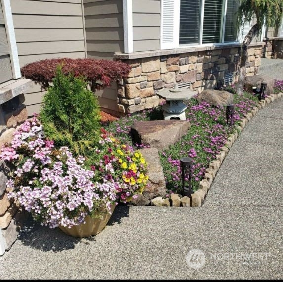 113 181st Street Southwest Bothell, WA 98012 - Photo 24 of 26 a view of a pathway with flower plants