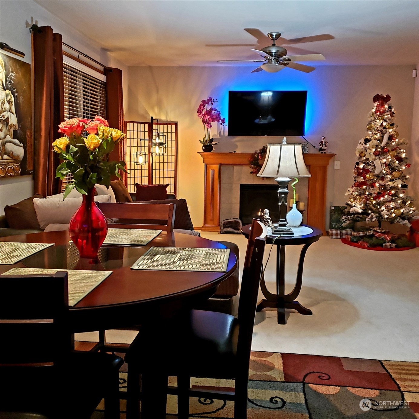 113 181st Street Southwest Bothell, WA 98012 - Photo 6 of 26 a view of a livingroom with furniture and a flat screen tv