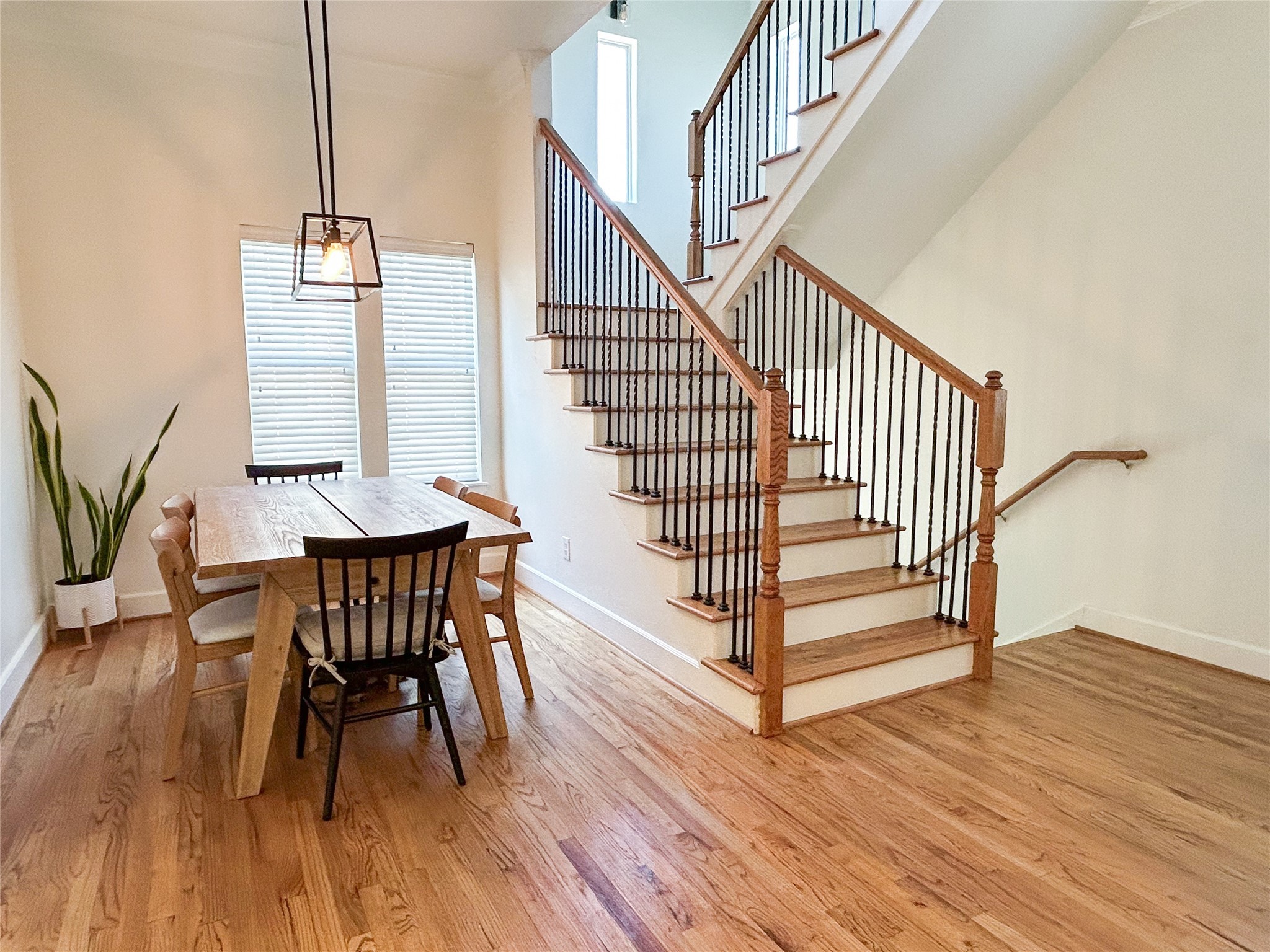 1128 West 26th Street Houston, TX 77008 - Photo 17 of 34 a view of entryway with wooden floor and stairs
