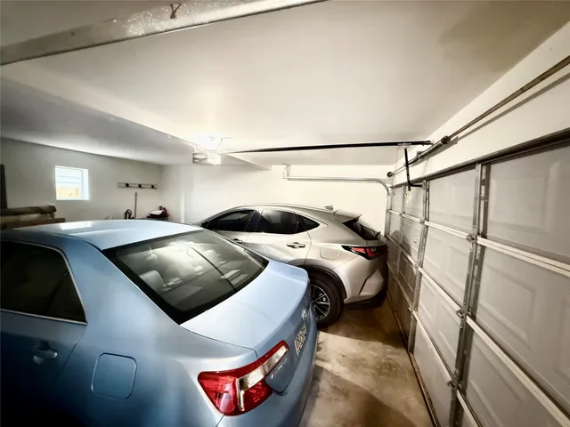 a bedroom with a bed and a walk in closet