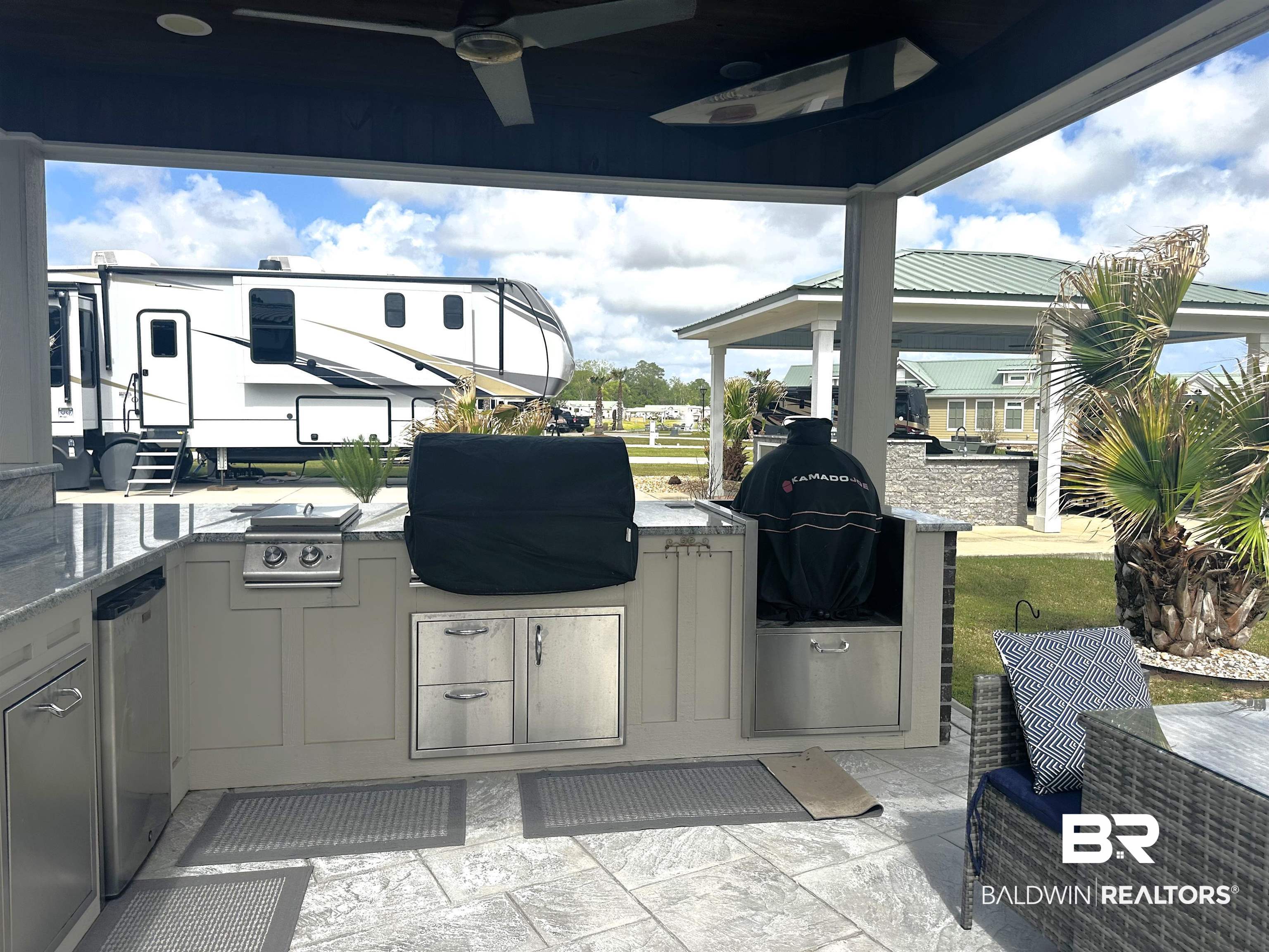 28058 Migratory Way, Unit 100 Elberta, AL 36530 - Photo 25 of 83 View of patio with a gazebo, a grill, an outdoor kitchen, and ceiling fan