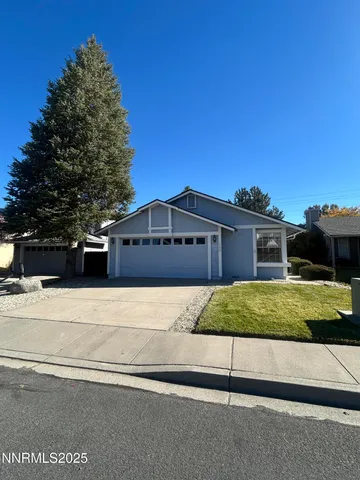 a house view with a garden space