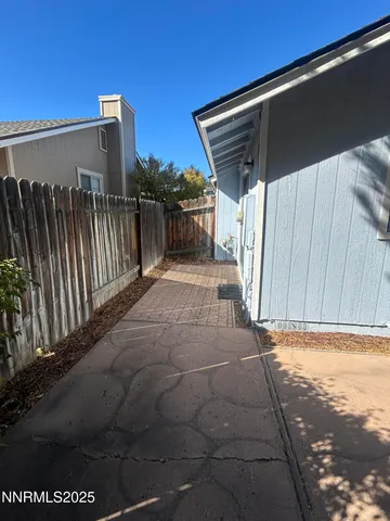 a view of a back yard of the house