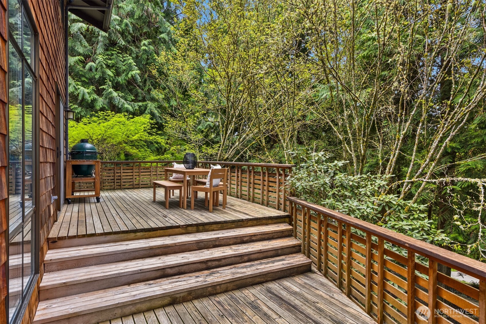 8151 Northeast Hidden Cove Road Bainbridge Island, WA 98110 - Photo 30 of 40 a view of balcony with deck and outdoor seating