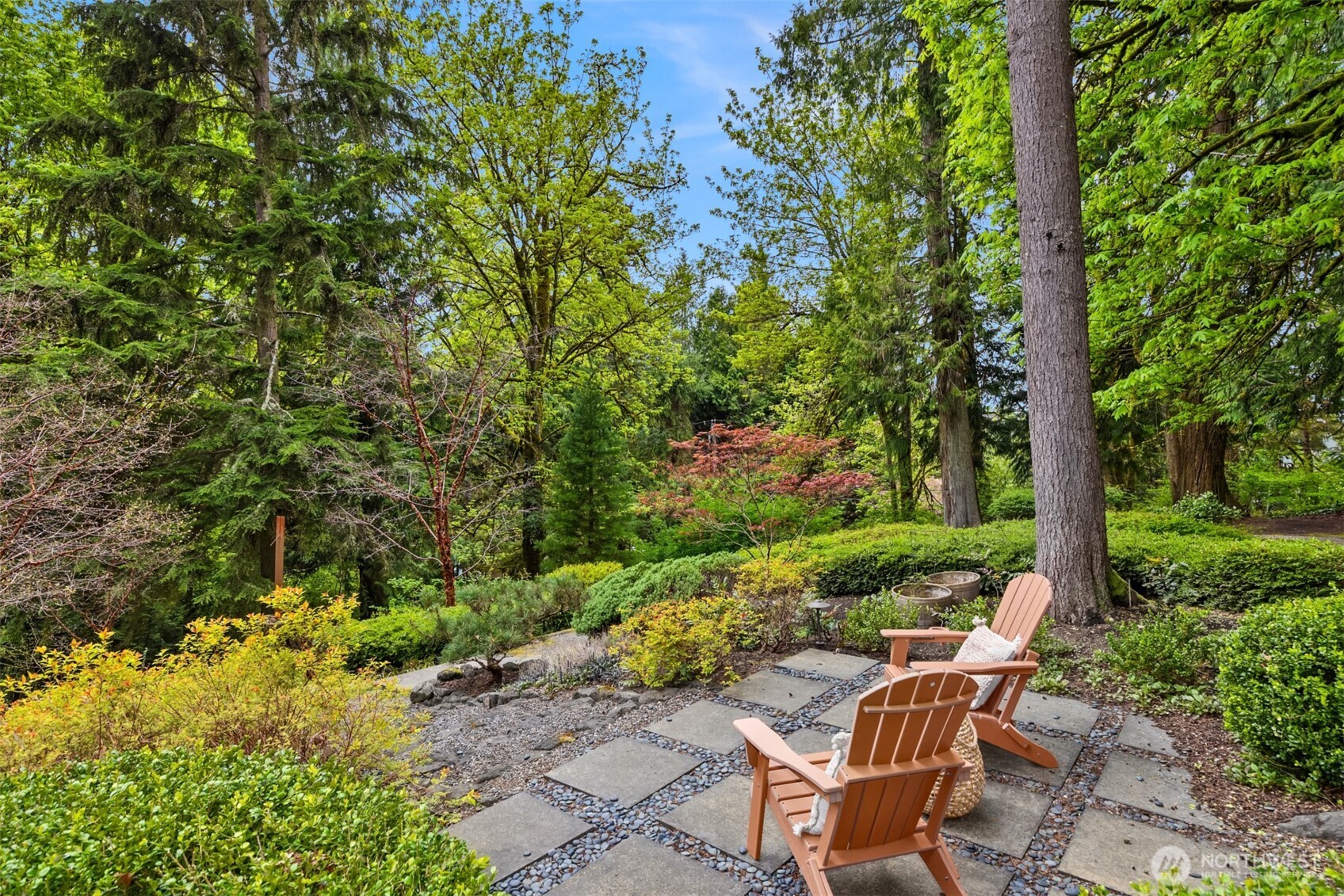 8151 Northeast Hidden Cove Road Bainbridge Island, WA 98110 - Photo 33 of 40 a view of backyard with outdoor seating and green space