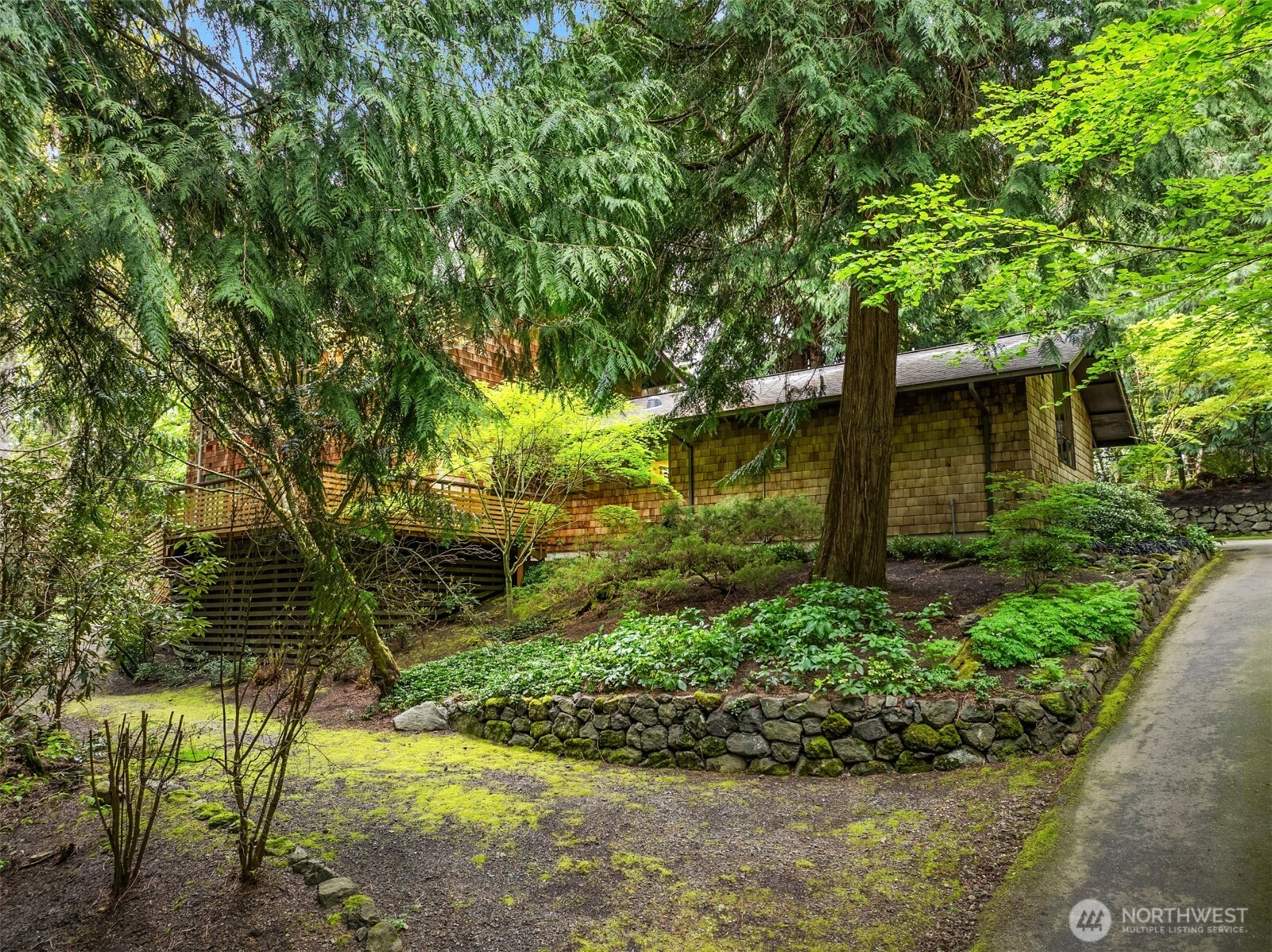 8151 Northeast Hidden Cove Road Bainbridge Island, WA 98110 - Photo 35 of 40 a view of a garden
