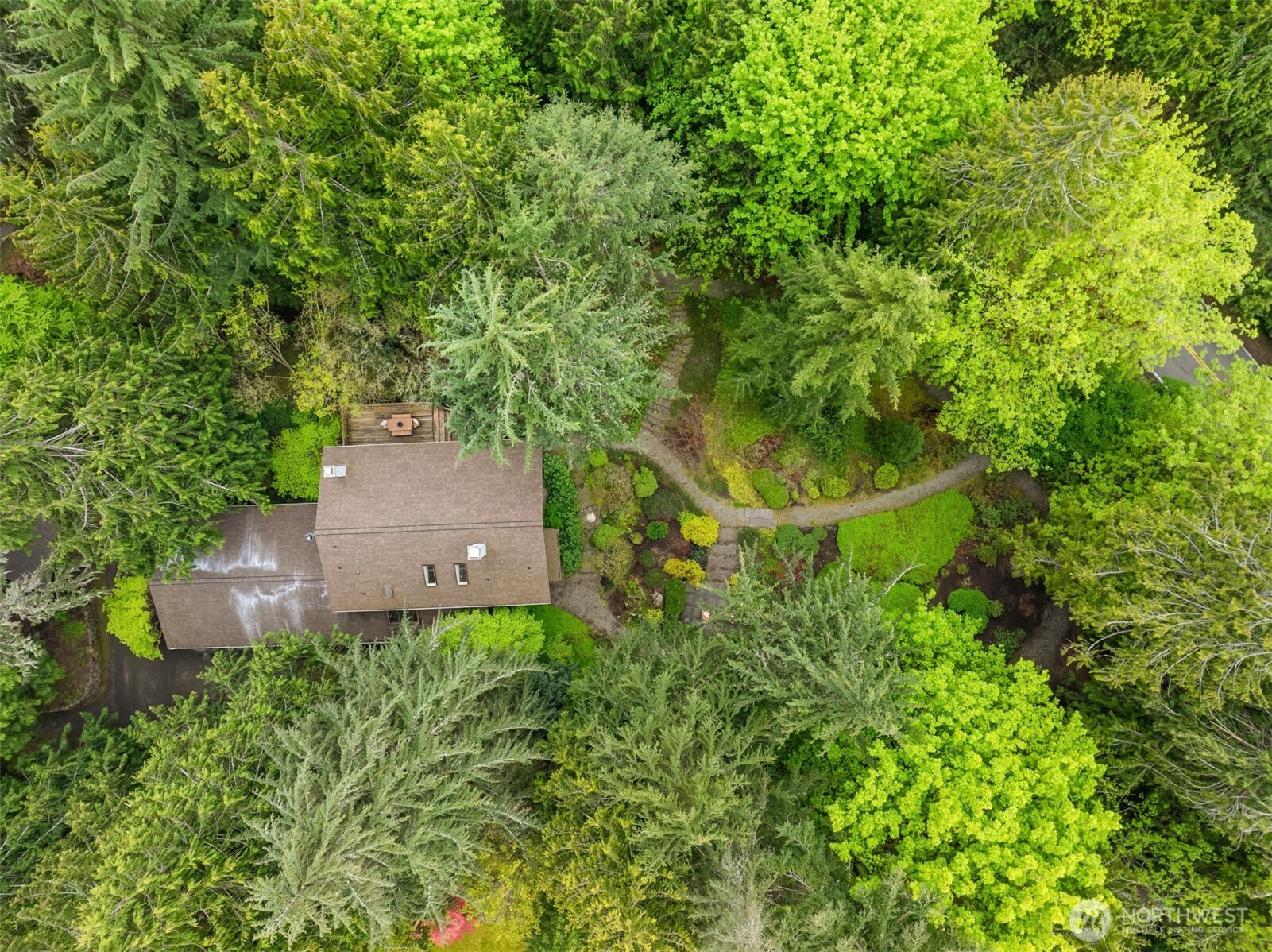 8151 Northeast Hidden Cove Road Bainbridge Island, WA 98110 - Photo 38 of 40 an aerial view of a house with a yard