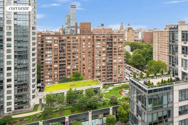 a view of a city with tall buildings