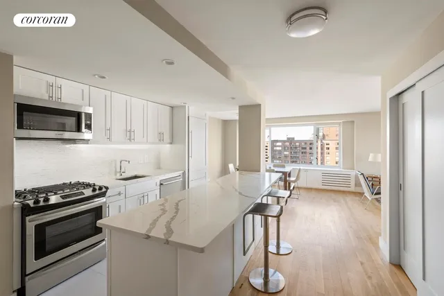 a picture of a bathroom with a shower